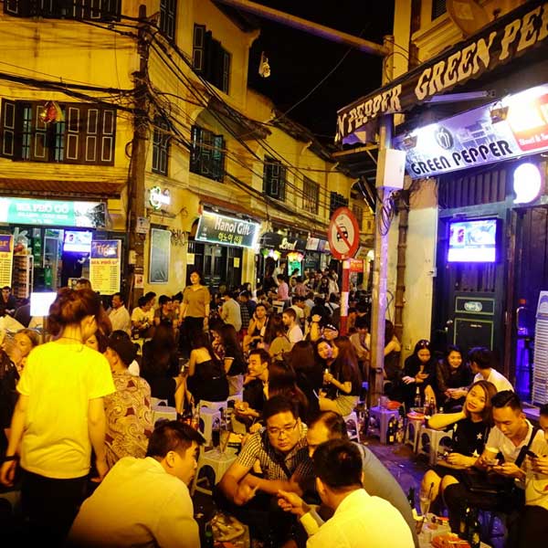 boozing-at-ta-hien-street-after-hanoi-night-market